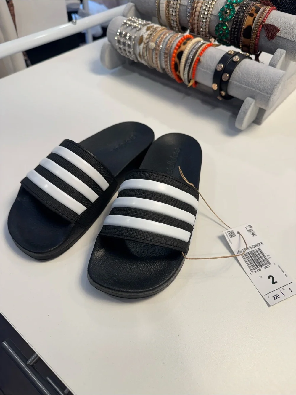 adidas Kids’ Black and White Slide Sandals with Three Stripes